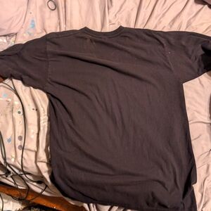 Plain black T-shirt, no label, no size, very soft